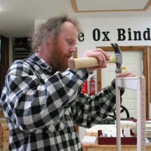 Preparing a frame for reverse thread mounting of the parchment